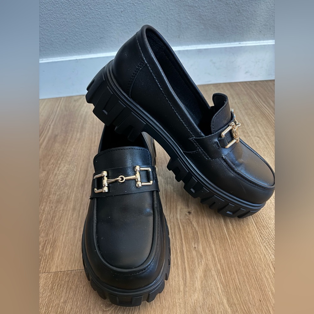 Black Loafers with Gold Accent